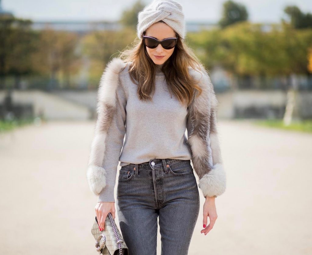 Alexandra Lapp wearing turban style in Paris, a cashmere turban from Falconeri, cashmere turtleneck pullover with fur sleeves from Falconeri, Levis 501 Skinny Fit jeans in black, sunglasses with pearls from Chanel, beige suede ankle boots by Gianvito Rossi and Dionysus GG Supreme shoulder bag from Gucci is seen during Paris Fashion Week Spring/Summer 2018 on September 29, 2017 in Paris, France.