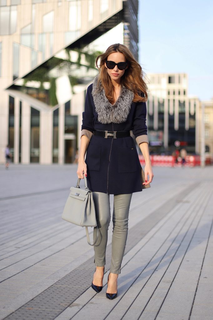 Airfield, Jbrand, Christian Louboutin, Hermès, Céline Model and Blogger Alexandra Lapp in a Long Cardigan Look wearing a long cardigan coat by Airfield, grey leather pants from Jbrand, black So Kate Heels from Christian Louboutin, grey Kelly bag by Hermès, vintage Buckle belt from Hermès and black Audrey sunglasses by Céline.