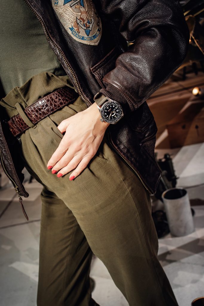 Alexandra Lapp in a Silver Spitfire Look, wearing a IWC Spitfire watch while visiting the IWC Schaffhausen booth at the SIHH 2019 in Geneva.