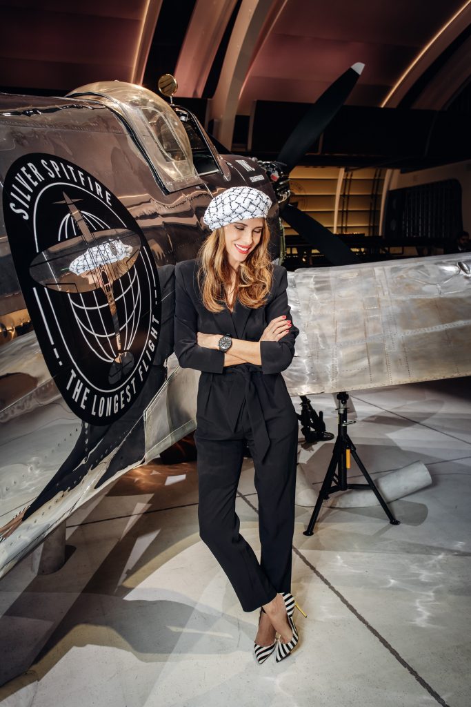 AlexAlexandra Lapp in a Silver Spitfire Look, wearing a IWC Spitfire watch while visiting the IWC Schaffhausen booth at the SIHH 2019 in Geneva.