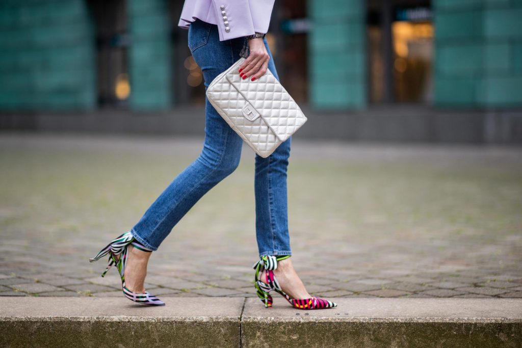Alexandra Lapp in a Balenciaga Blazer look, wearing a pastel lilac double breasted blazer from Balenciaga, a pastel t-shirt with a logo print from Balmain, high rise skinny jeans Olivia from Citizens of Humanity, a vintage silver flap bag by Chanel and the Toubinana 80 Satin Cinestripes Multicolored Pumps from Christian Louboutin on May 01, 2019 in Duesseldorf, Germany. (Photo by Christian Vierig/Getty Images)