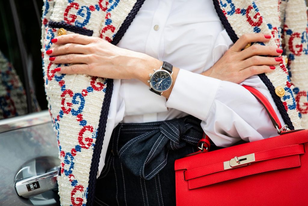 IWC, IWC Schaffhausen, Chronograph, watch, portofino, swiss made, mercedes, mercedes benz, eqc Alexandra Lapp in a Women and Technology look, is seen wearing a IWC Portofino Chronograph in front of a Mercedes EQC during MBFW Berlin.