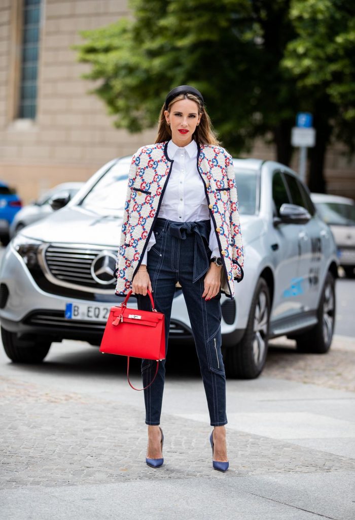 IWC, IWC Schaffhausen, Chronograph, watch, portofino, swiss made, mercedes, mercedes benz, eqc Alexandra Lapp in a Women and Technology look, is seen wearing a IWC Portofino Chronograph in front of a Mercedes EQC during MBFW Berlin.