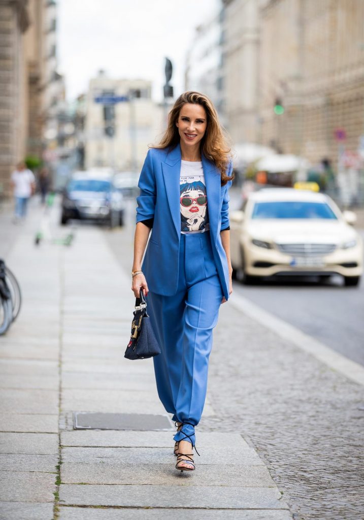 Alexandra Lapp is seen wearing a blue Zara suit, white Re/Done print T-shirt, blue Roger Vivier denim Viv’ bag, white miu miu cat-eye shaped sunglasses during Berlin Fashion Week on July 02, 2019 in Berlin, Germany. (Photo by Christian Vierig/Getty Images)