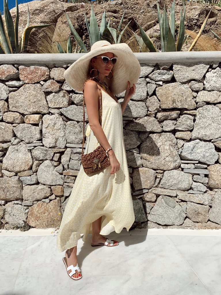 Silvia Tcherassi, Hermès, Chanel, Gianvito Rossi, miu miu, H&M, Zara, Céline, Dior, Rhode Resort, Seafolly, Hemand und Nandita, Sensi Studio, Simone Rocha, TKEES, Ba&sh, Lovers + Friends, Prada, Milkwhite, Missoni, Jets by Jessika Allen Alexandra Lapp in a Mykonos Look is seen on vacation on the Greek Islands