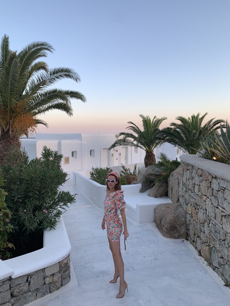 Silvia Tcherassi, Hermès, Chanel, Gianvito Rossi, miu miu, H&M, Zara, Céline, Dior, Rhode Resort, Seafolly, Hemand und Nandita, Sensi Studio, Simone Rocha, TKEES, Ba&sh, Lovers + Friends, Prada, Milkwhite, Missoni, Jets by Jessika Allen Alexandra Lapp in a Mykonos Look is seen on vacation on the Greek Islands