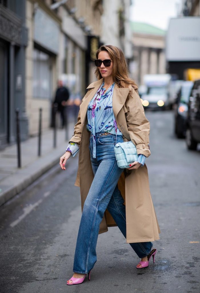 PARIS, FRANCE - FEBRUARY 25: Alexandra Lapp is seen wearing Jeans Jane Flare from Celine, double breasted trench coat from Valentino, Stella McCartney blouse, Bottega Veneta Padded Cassette bag in leather in light blue, Bottega Veneta sunglasses - all from Breuninger during Paris Fashion Week - Womenswear Fall/Winter 2020/2021