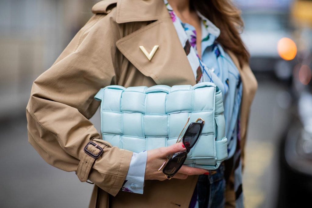 PARIS, FRANCE - FEBRUARY 25: Alexandra Lapp is seen wearing Jeans Jane Flare from Celine, double breasted trench coat from Valentino, Stella McCartney blouse, Bottega Veneta Padded Cassette bag in leather in light blue, Bottega Veneta sunglasses - all from Breuninger during Paris Fashion Week - Womenswear Fall/Winter 2020/2021