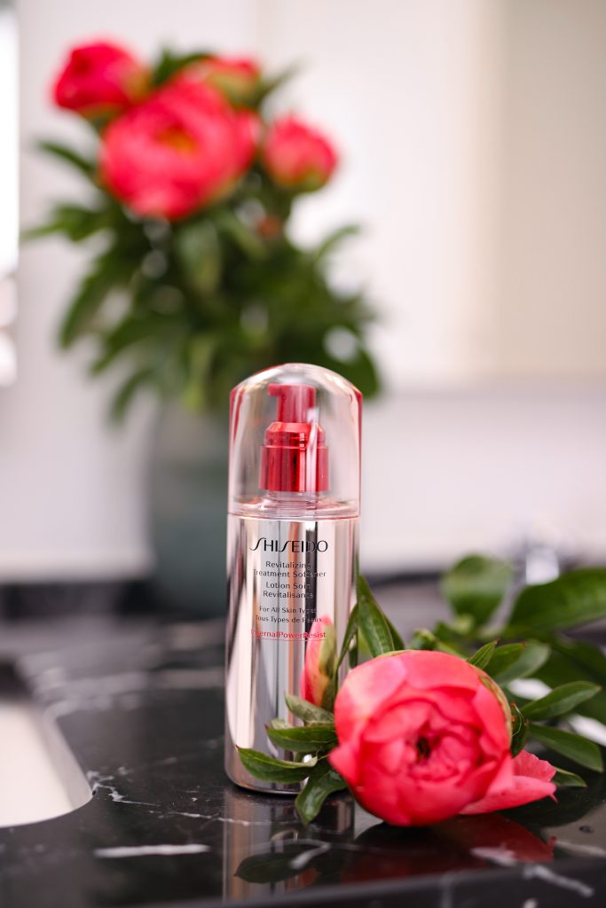 Alexandra Lapp applying the SHISEIDO Revitalizing Treatment Softener.