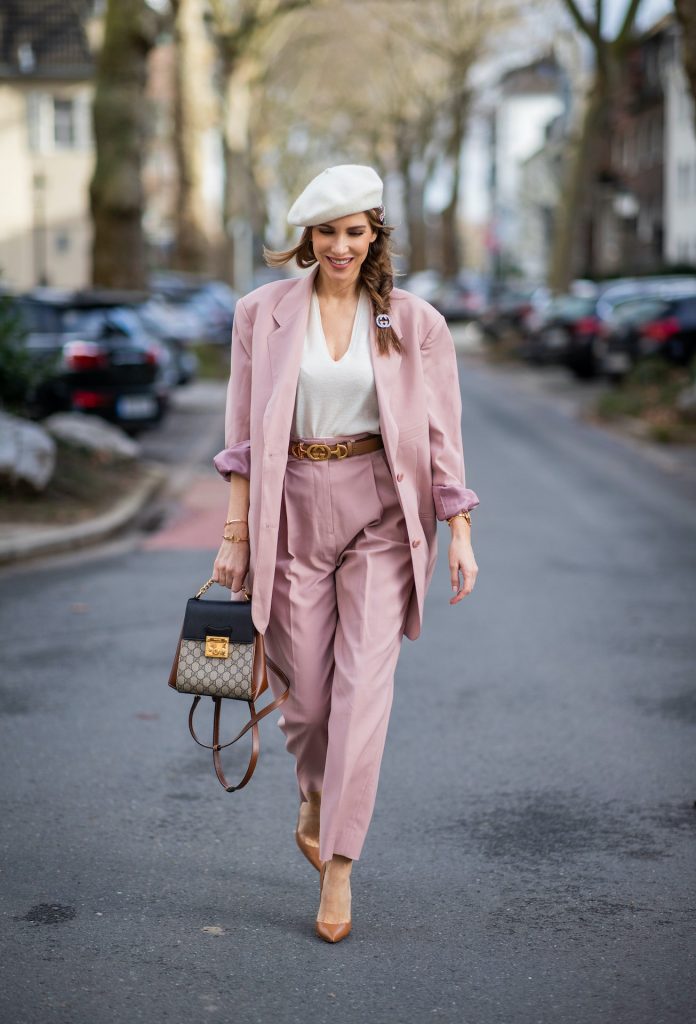 PASTEL SUITS, Alexandra Lapp, Pastel Suits, The Frankie Shop, Gucci, Christian Louboutin, Tiffany, Rolex Alexandra Lapp is seen wearing pastel suits from FRANKIE SHOP Pernille single-breasted blazer and Pernille high-rise pants in pastel pink , vintage beret in off white, GUCCI logo belt in camel, GUCCI monogram backpack in black and brown, GUCCI hair clips and CHRISTIAN LOUBOUTIN Kate pumps in camel.
