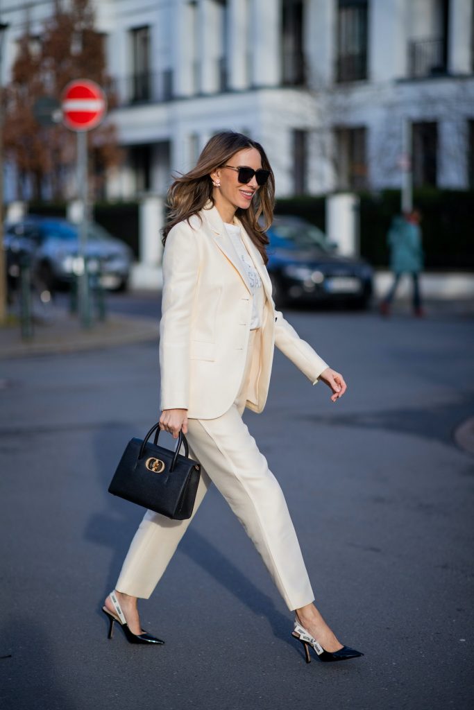 PASTEL SUITS, Alexandra Lapp, Pastel Suits, Dior, Christian Dior Alexandra Lapp is seen wearing pastel suits from CHRISTIAN DIOR blazer in creme, CHRISTIAN DIOR trousers in creme, CHRISTIAN DIOR t-shirt, CHRISTIAN DIOR St Honoré Tote bag in black, CHRISTIAN DIOR J’Adior Slingback pumps and BOTTEGA VENETA sunglasses in black.