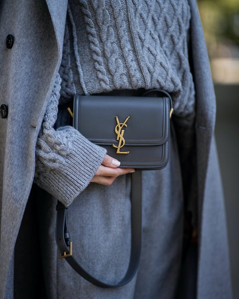 Alexandra Lapp, Shades of Grey, Autumn Favorites, Knitwear, Cashmere, Monochrome, Max Mara Studio, Stella McCartney, Saint Laurent Alexandra Lapp is seen wearing a grey Max Mara Cashmere Coat, Saint Laurent cross body bag, Stella McCartney cable knit jumper, Max Mara Studio high waisted trousers, Celine sunglasses and Saint Laurent cowboy boots.