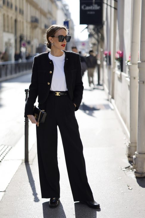 Alexandra Lapp, black look, Paris Fashion Week, France, Celine, Hermès, Balmain, Maison Common, Gucci, Chanel, Zara, Saint Laurent, Boucle, Tweed, Vivien Sophie, VIVI, Louis Vuitton, Spring, PFW Alexandra Lapp is seen wearing ROSSI pants in black, CELINE bag, CELINE belt in black,CELINE trainer low lace-up loafer, MASSIMO DUTTI t-shirt, CELINE chasseur jacket in boucle matte black, TIFFANY City HardWear in gold during a street style shoot.