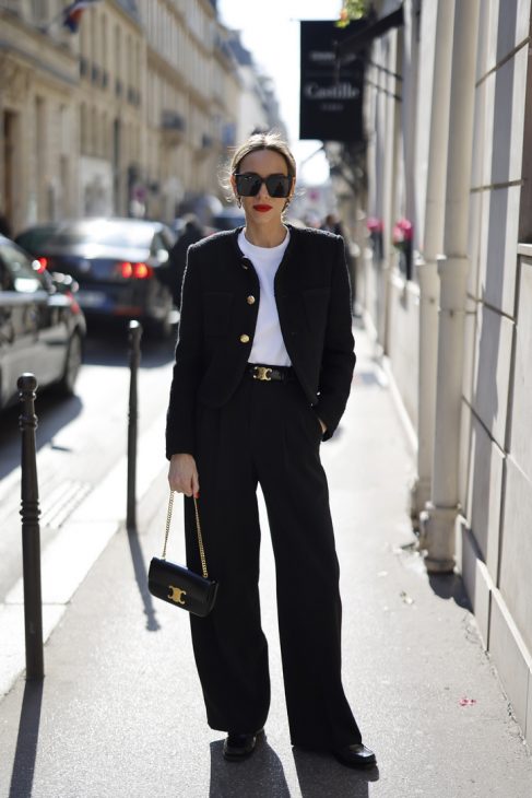 Alexandra Lapp, black look, Paris Fashion Week, France, Celine, Hermès, Balmain, Maison Common, Gucci, Chanel, Zara, Saint Laurent, Boucle, Tweed, Vivien Sophie, VIVI, Louis Vuitton, Spring, PFW Alexandra Lapp is seen wearing ROSSI pants in black, CELINE bag, CELINE belt in black,CELINE trainer low lace-up loafer, MASSIMO DUTTI t-shirt, CELINE chasseur jacket in boucle matte black, TIFFANY City HardWear in gold during a street style shoot.