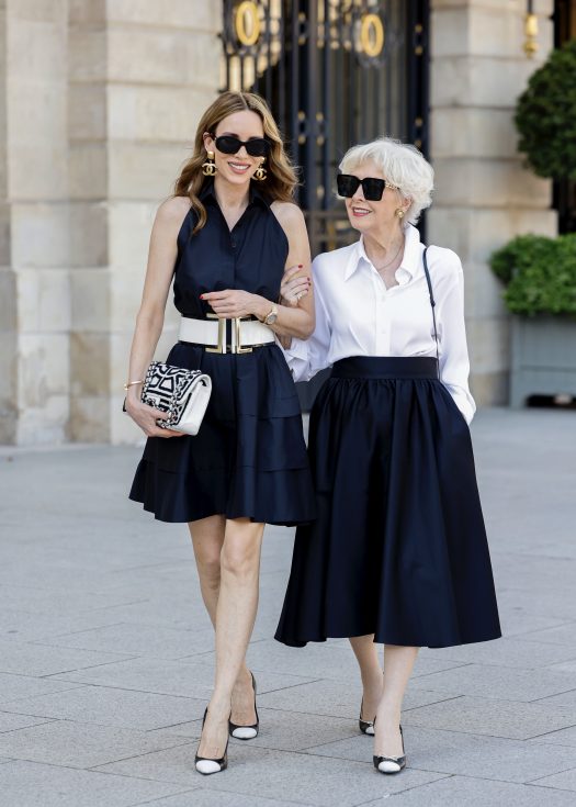 Alexandra Lapp is seen wearing Alexandra Lapp x Seidensticker capsule collection Black Sleeveless Taft Dress, White Triacetat Blouse, and Black Taft Midi Skirt in Paris, Summer 2024.