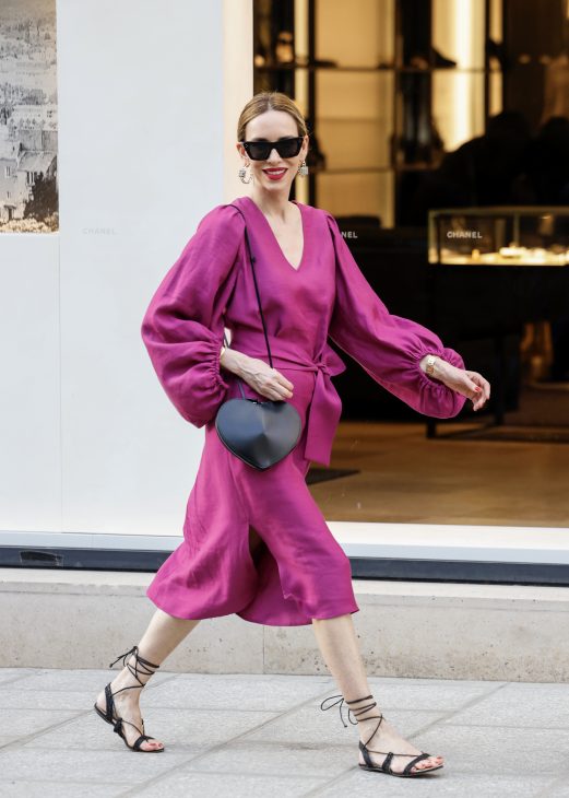 Alexandra Lapp is seen wearing Alexandra Lapp x Seidensticker capsule collection Black Linen Mix Dress, and Wild Aster Linen Mix Dress in Paris, Summer 2024.