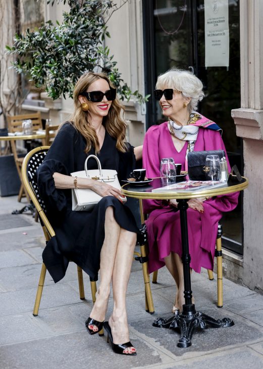 Alexandra Lapp is seen wearing Alexandra Lapp x Seidensticker capsule collection Black Linen Mix Dress, and Wild Aster Linen Mix Dress in Paris, Summer 2024.