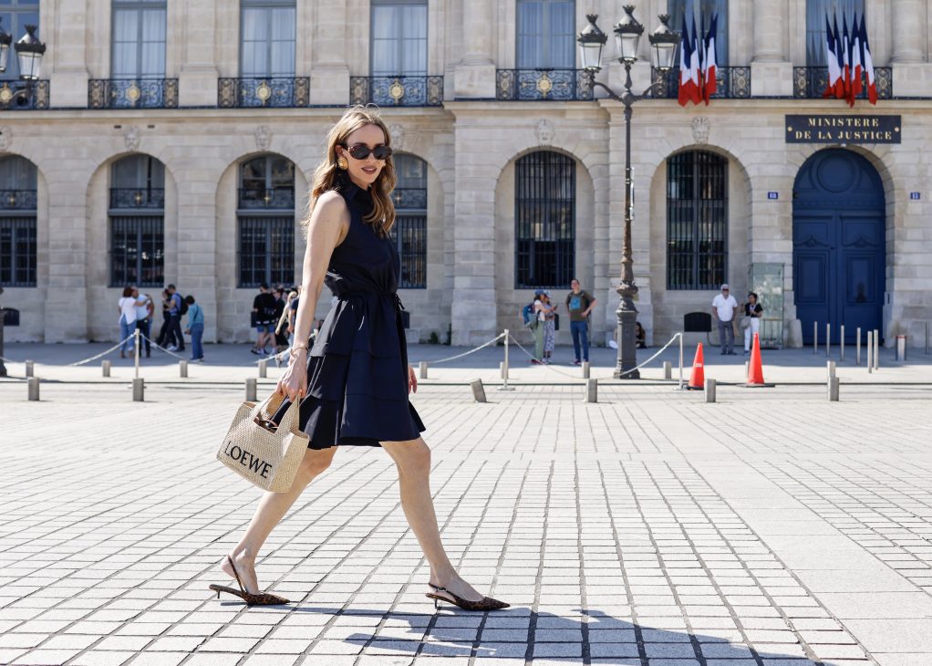 Alexandra Lapp is seen wearing Alexandra Lapp x Seidensticker capsule collection Black Sleeveless Taft Dress in Paris, Summer 2024.
