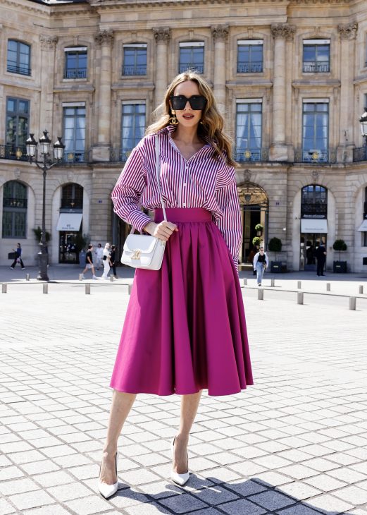 Alexandra Lapp is seen wearing Alexandra Lapp x Seidensticker capsule collection White Triacetat Blouse, and Black Taft Midi Skirt, Wild Aster Cotton Twill Shirt, Wild Aster Midi Skirt in Paris, Summer 2024.