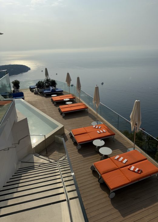 Alexandra Lapp, The Maybourne Riviera, Monaco, Monte Carlo, Cote D Azure Alexandra Lapp returns to The Maybourne Riviera, a hotel perched high above the Mediterranean in Roquebrune-Cap-Martin and overlooking the sparkling lights of Monte-Carlo, it is a retreat where architecture, design, and nature exist in perfect harmony, suspended between horizon and sea.