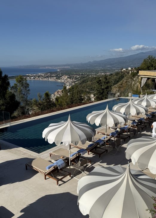 Alexandra Lapp, Four Seasons Taormina, San Domenico Palace, Sicily holidays, luxury travel Sicily, Taormina Italy, luxury hotel Sicily, Italian summer, luxury vacation, fashion influencer travel, Mediterranean lifestyle, Sicilian getaway, Four Seasons Sicily, luxury resort Italy, Taormina holidays, Seidensticker x Alexandra Lapp, Hermès, Kelly Bag, Christian Dior, Saint Laurent, Seidensticker Alexandra Lapp enjoying a luxury holiday at San Domenico Palace, Taormina, A Four Seasons Hotel in Sicily, Italy. The fashion and lifestyle influencer experiences the beauty of the iconic Four Seasons resort overlooking the Ionian Sea and the historic town of Taormina. Elegant resort style, Mediterranean charm, and luxury travel inspiration capture the essence of a perfect Sicilian getaway.