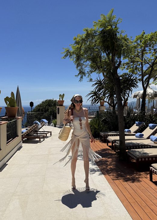 Alexandra Lapp enjoying a luxury holiday at San Domenico Palace, Taormina, A Four Seasons Hotel in Sicily, Italy. The fashion and lifestyle influencer experiences the beauty of the iconic Four Seasons resort overlooking the Ionian Sea and the historic town of Taormina. Elegant resort style, Mediterranean charm, and luxury travel inspiration capture the essence of a perfect Sicilian getaway.